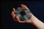 Objects 764071.JPG Hand holding a compact disk
