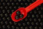 Red 616078.JPG Black marbles red spoon