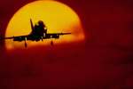 Red 616092.JPG Airplane and sunset